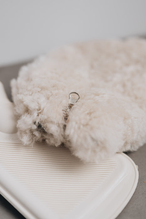 Mini Sheepskin Hot Water Bottle Cover in a soft oatmeal colour