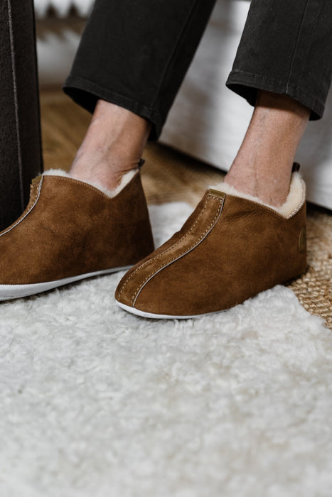 Mens Sheepskin Boot Slipper made from Sheepskin On the foot showing soft sole
