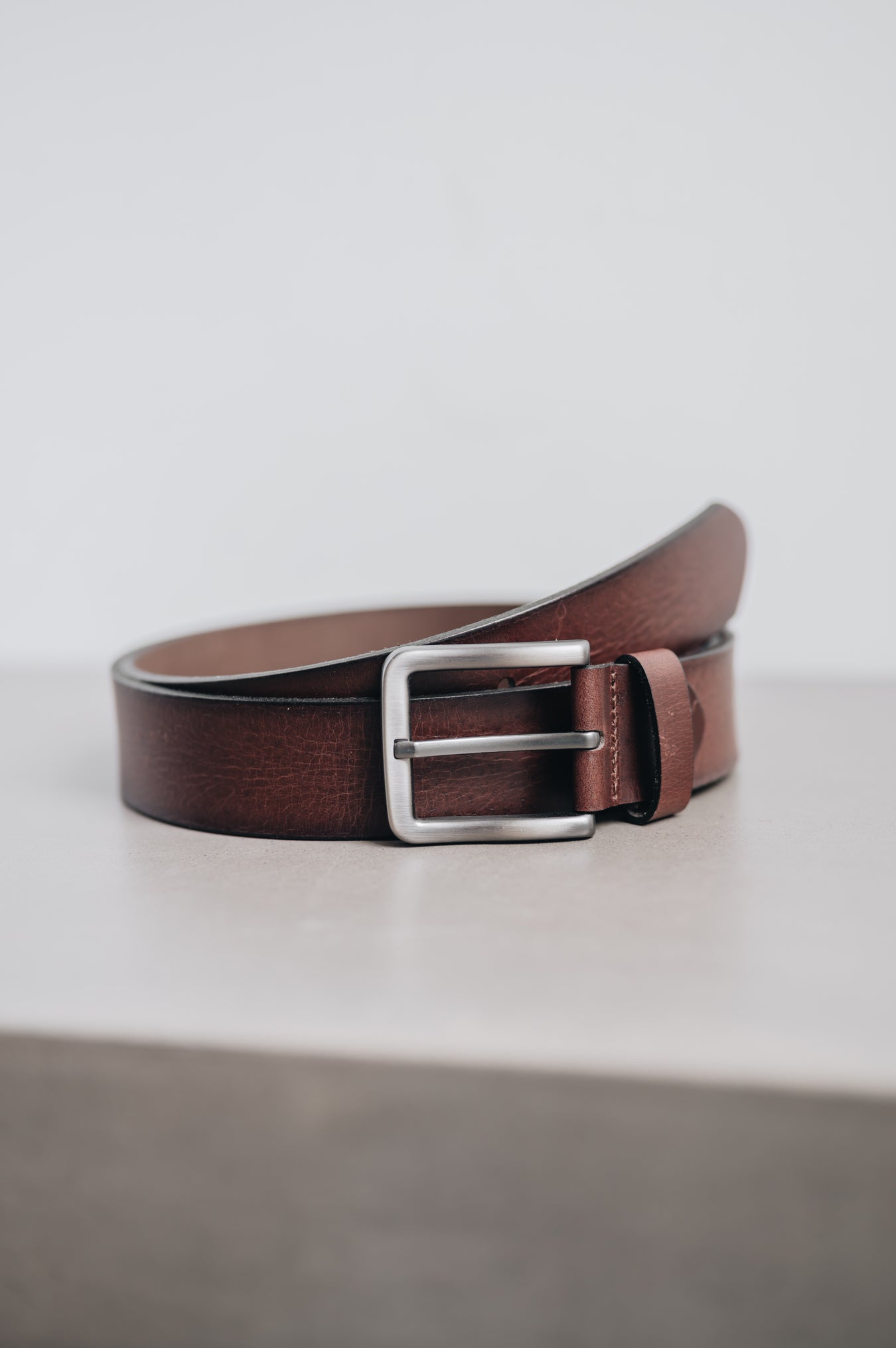 Unlike belts constructed from split leather filled with layers of lesser materials like cardboard, our belt is made from one solid piece of leather, guaranteeing it won’t break or wear down as others might. 