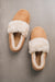 Sophisticated Westmorland Sheepskins women’s slippers with a durable sole and natural wool lining.