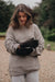 woman wearing sheepskin mittens brown