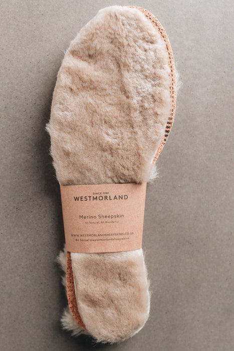 Natural colour Sheepskin Children's Cuttable Insoles. Cut to size. Wrapped in a cardboard informational sleave.