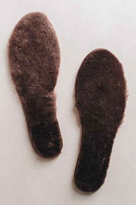 Brown colour Sheepskin Children's Cuttable Insoles. Cut to size. Insoles layed out to show Sheepskin material.