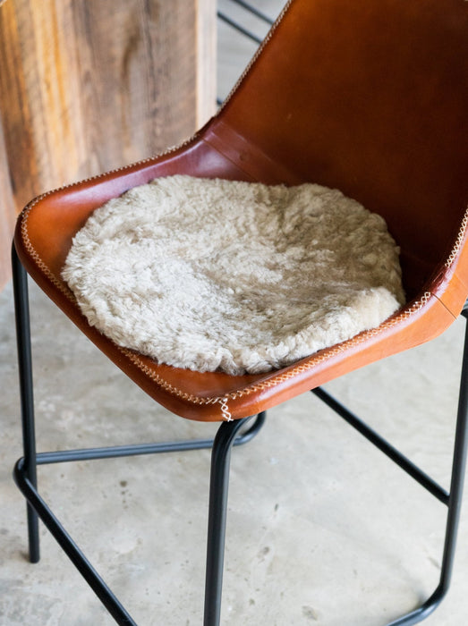 Oatmeal Round Waste Less Sheepskin Padded Seat Pad.