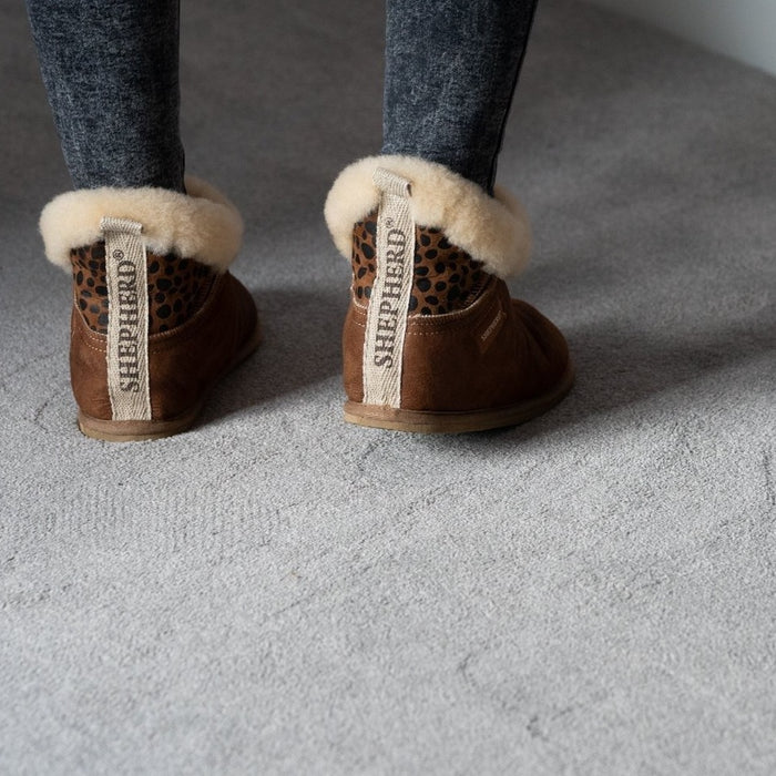 The Back of Bella Leopard Print Sheepskin Shepherd of Sweden women's Bella slipper boot with plush shearling interior